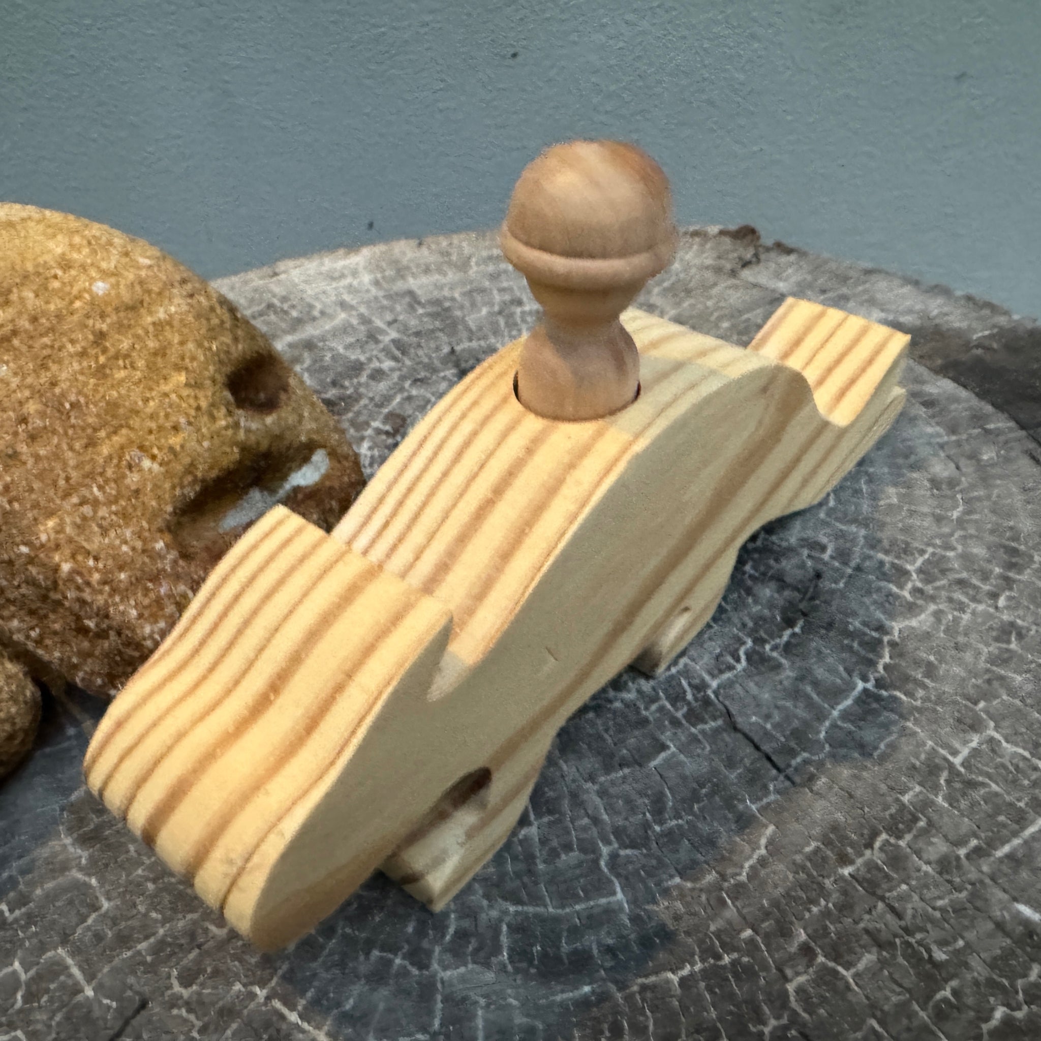 Wooden Dinosaur and Explorer Peg Doll